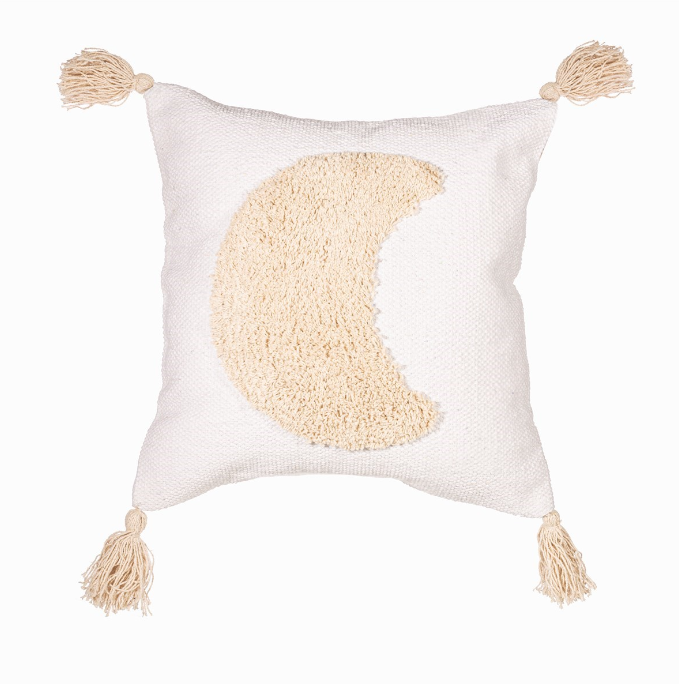 Photo of a cushion with a moon and tassels